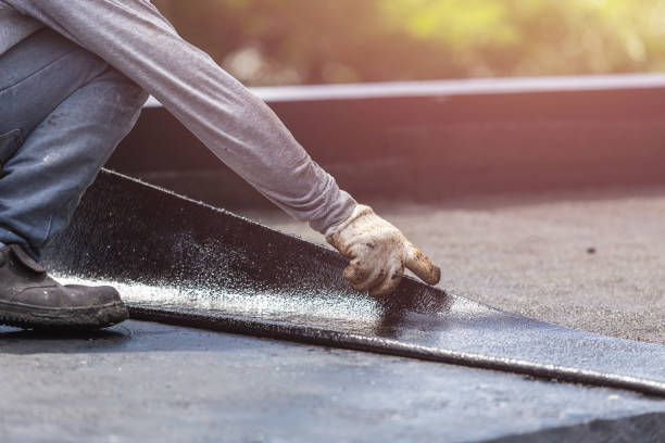 Professional Waterproofing technician working in North Tonawanda, NY